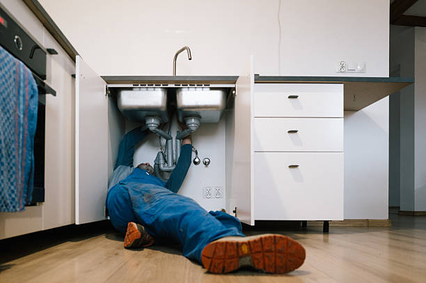 Professional Emergency Plumber technician working in Hopkins, MN